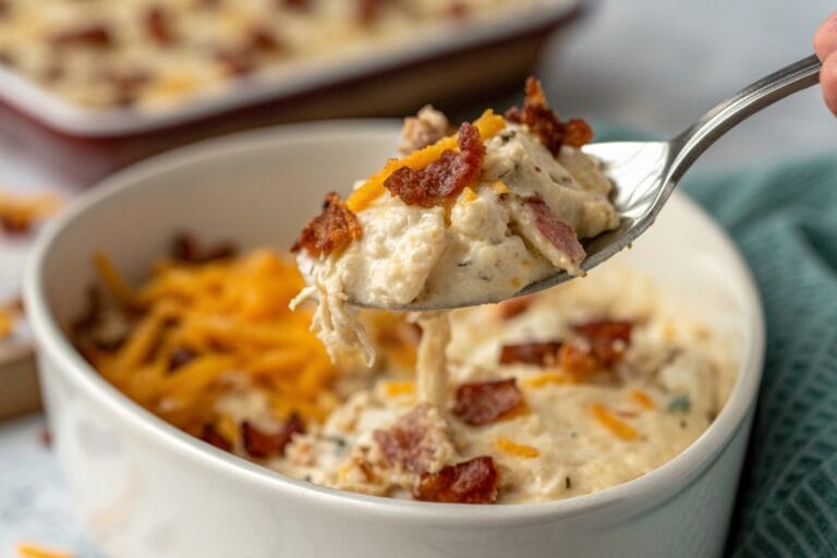 Creamy keto crack chicken with melted cheese and bacon from the crock pot