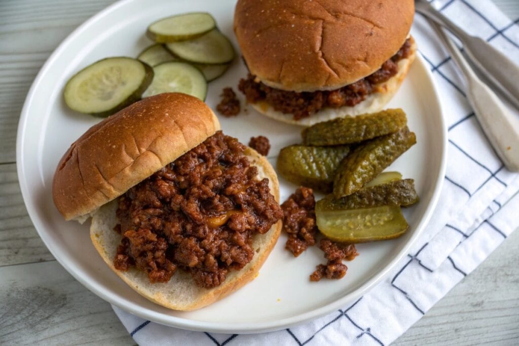 Easy sloppy joe recipe 3 ingredients sandwiches on a plate