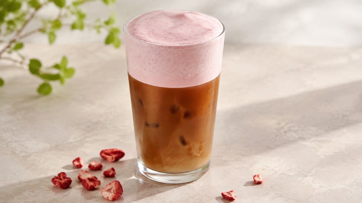 Strawberry cold foam without heavy cream over an iced drink